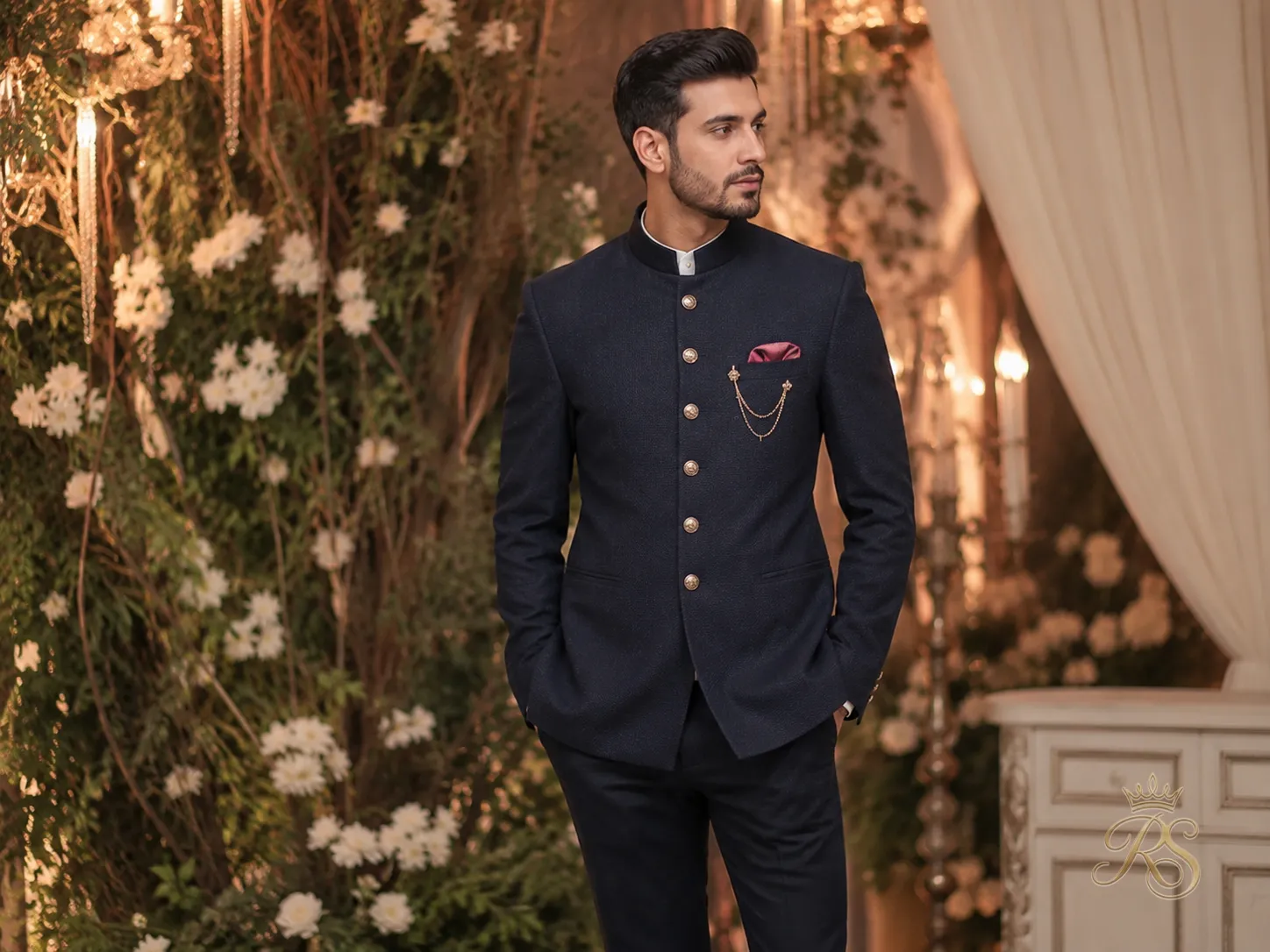 Groom in an Indo-Western Jodhpuri suit with tailored trousers and a contemporary wedding silhouette